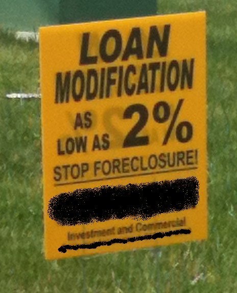 A real foreclosure-rescue street advertisement of the kind that targets homeowners in default