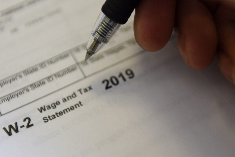 Pen resting on a W-2 wage and tax statement
